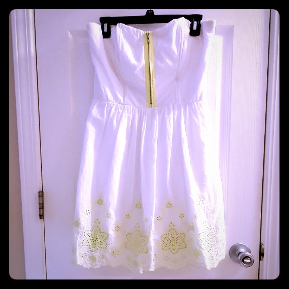 White strapless dress with neon green embroidery